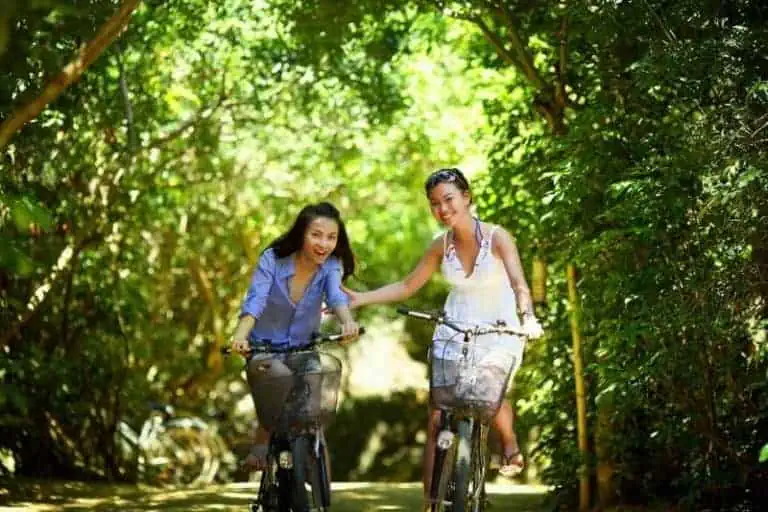 Young women bicycling in Haslet, TX