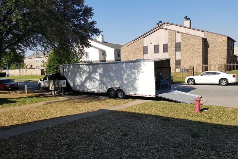 A moving truck ready to be unloaded at the destination home