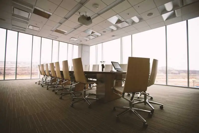 Office furniture in empty meeting room