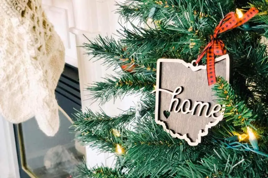 Christmas tree with an ornament with the text "Home"