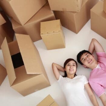 couple with moving boxes