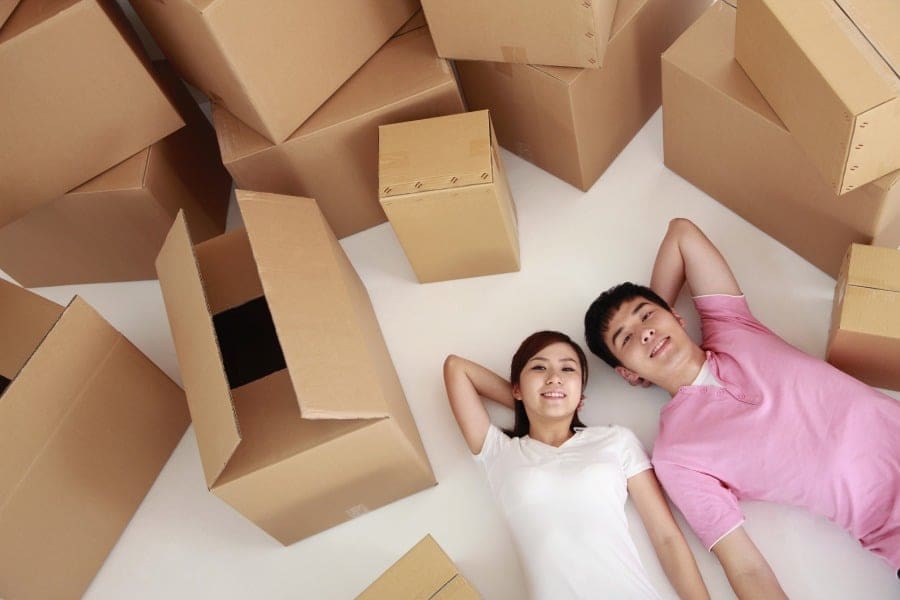 couple with moving boxes